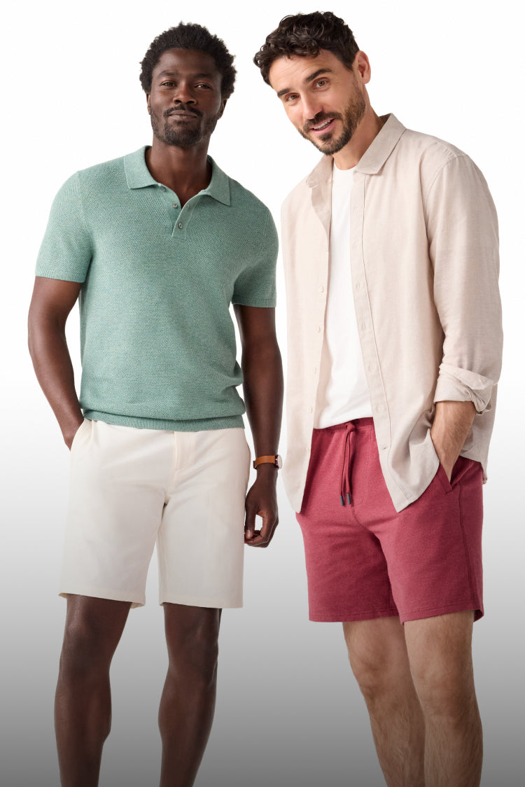 Two guys standing in various Mack Weldon products