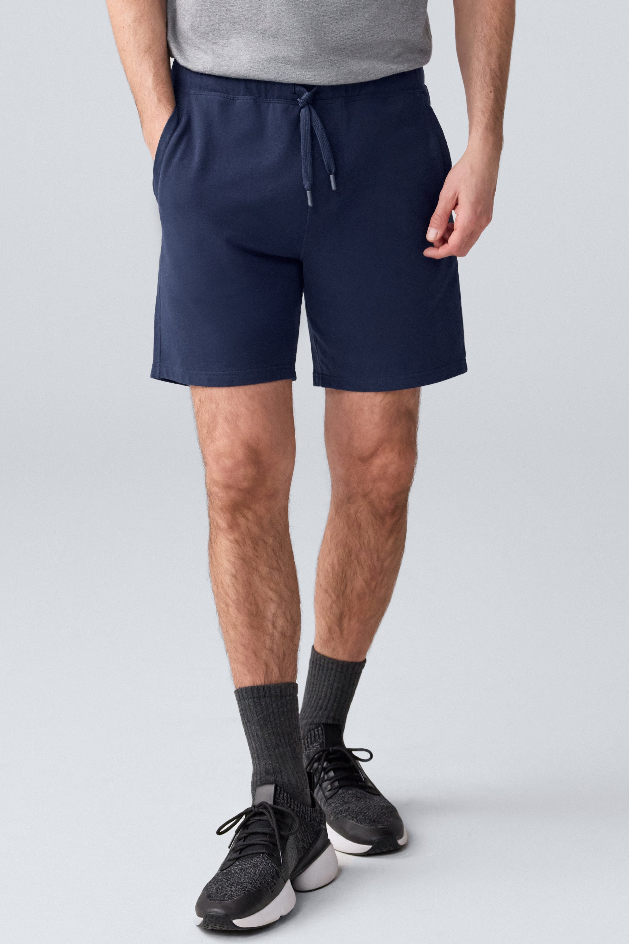 Man wearing Ace sweatshort 7" in Total Eclipse