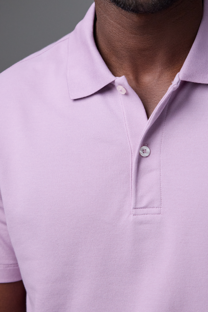 Detailed view of a man wearing Silver Pique Polo